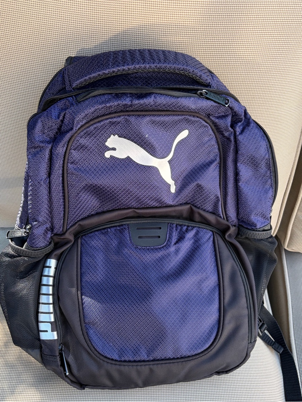 Puma Purple and Black Sports Backpack with White Logo